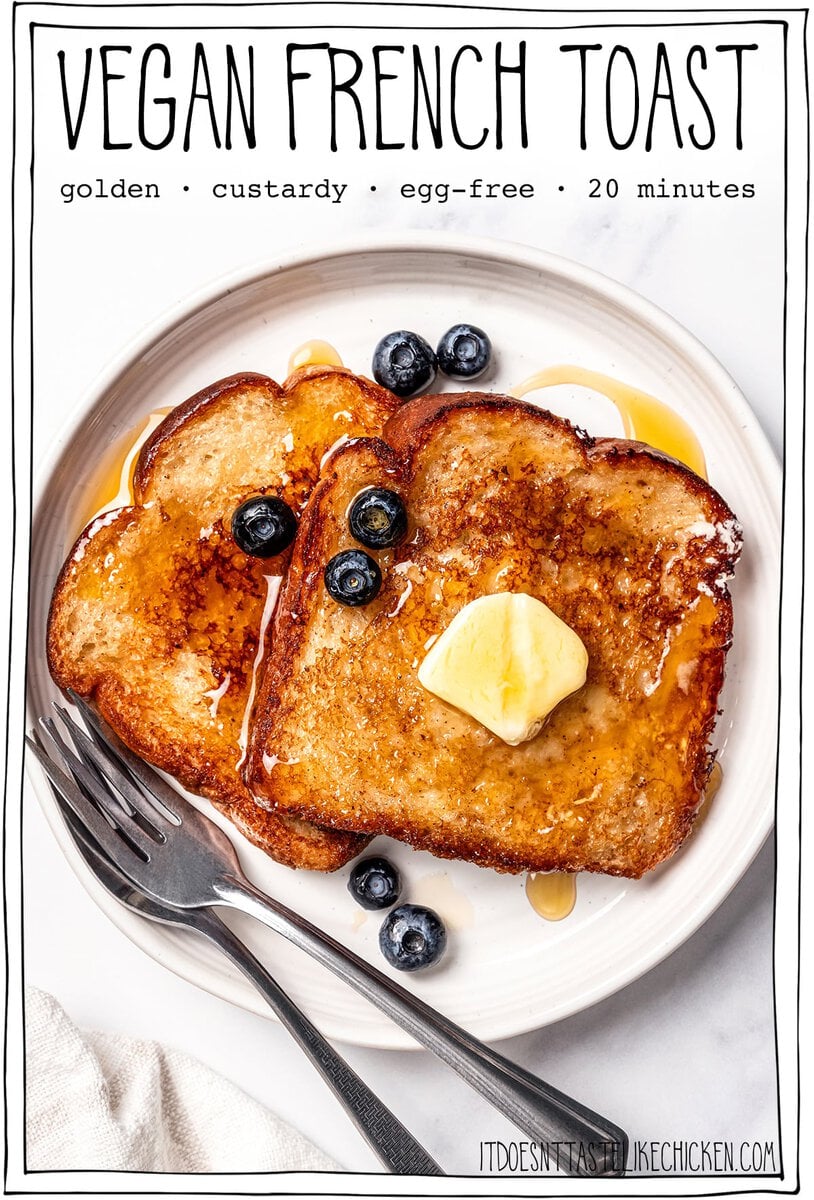 This Vegan French Toast recipe is crispy, fluffy and custardy, just like the classic! It's quick, easy and made with simple ingredients too. Plate of French toast with butter, syrup, and blueberries, with text overlay that reads vegan French toast.