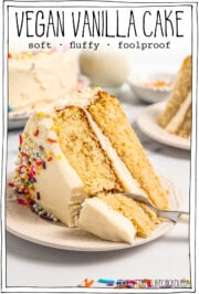 Slice of cake on plate with fork cutting into tip, with text overlay that reads vegan vanilla cake.