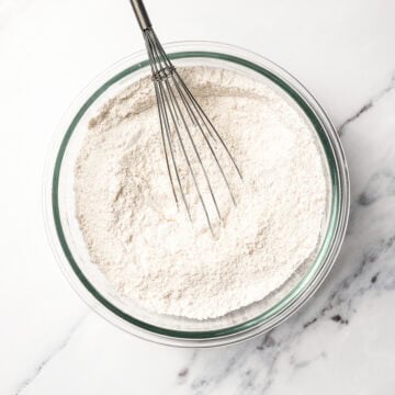 Whisk in bowl with dry cake ingredients.