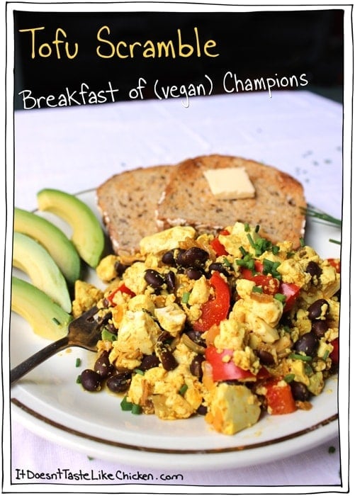 Tofu Scramble: Breakfast of (vegan) champions! This is my favourite hearty classic vegan breakfast recipe. Spiced to perfection with peppers, beans, onions, and mushrooms for a perfect savoury brunch. #itdoesnttastelikechicken #veganrecipes #veganbreakfast #tofu