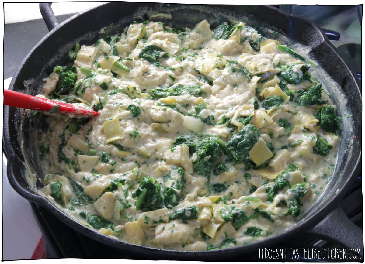 Mix in the spinach and artichokes and then bake!