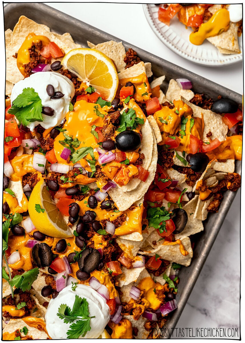 Sheet pan of loaded vegan nachos.