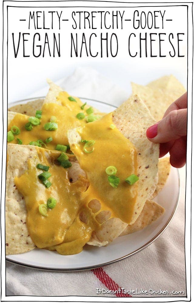 Vegan Nacho Cheese! Only 15 minutes to make this melty, stretchy, gooey, dairy-free cheese. Pour it on nachos, serve it on a baked potato, use it in a quesadilla, or wherever you desire. #itdoesnttastelikechicken #veganrecipes #vegancheese