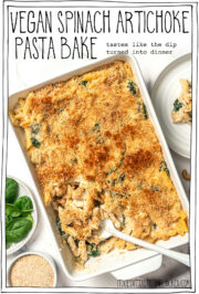 Casserole dish with pasta, with text overlay that reads vegan spinach artichoke pasta bake.