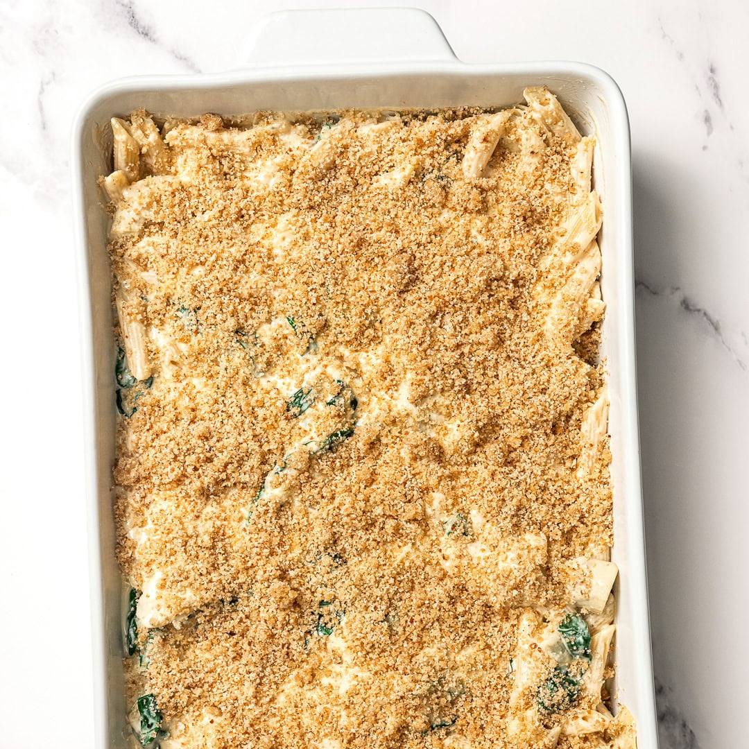 Breadcrumbs added to spinach artichoke pasta bake.