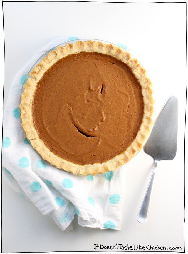 Easy vegan pumpkin pie! 9 easy ingredients, combine in a blender, pour into a pie shell, and bake. Done! Tastes best when made ahead of time making it a stress-free Thanksgiving dessert. The BEST go-to vegan pumpkin pie recipe ever. #itdoesnttastelikechicken #vegandesserts #veganthanksgiving