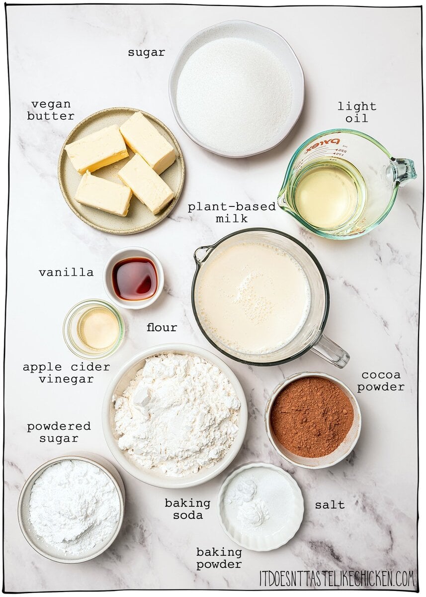 This moist, rich vegan chocolate cake is finished with fluffy chocolate buttercream, perfect for birthdays and holidays. So easy to make too! Ingredients for vegan chocolate cake.