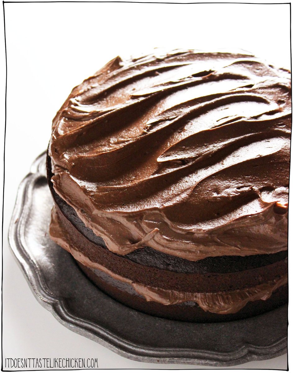 Fudgy, rich, moist, and decadent- this vegan chocolate cake is truly the best cake ever! No one will know it's vegan. This fan-favorite chocolate cake is made with ingredients that are easy to find at your local grocery store, just mix, pour, and bake! The perfect simple chocolate cake recipe to celebrate birthdays and holidays. 