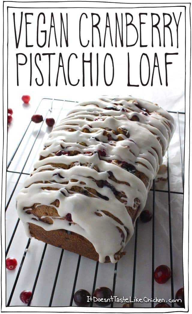 Vegan Cranberry Pistachio Loaf with icing. Easy to make and a perfect morning treat with coffee or tea. Looks very festive for the holiday season and Christmas, but delicious anytime of year. #itdoesnttastelikechicken #VMBC