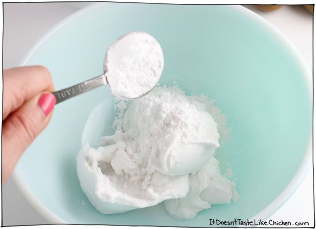 Vegan Coconut Whipped Cream! Just 2 ingredients and only 5 minutes to make. The perfect dairy free whipped cream for pies, cakes, and even lattes! #itdoesnttastelikechicken