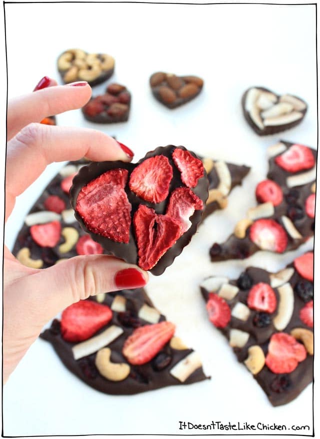 Easy Fruit & Nut Vegan Chocolates! This Valentine's Day gift recipe is so incredibly easy, just melt dairy-free chocolate chips, pour into a mold or onto parchment paper, then top with your favourite dried fruit and nuts. #itdoesnttastelikechicken