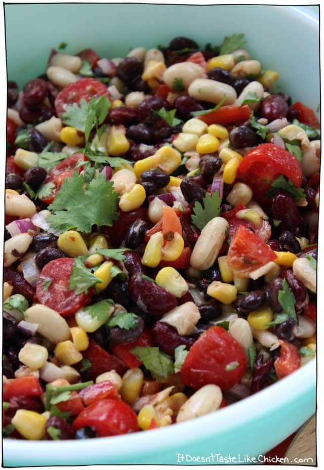 Creamy Chipotle Lime Bean Salad! This flavor-packed vegan dish takes just 15 minutes to make and can be made ahead of time. Perfect for potlucks and parties! Dairy Free, gluten free, vegetarian. #itdoesnttastelikechicken