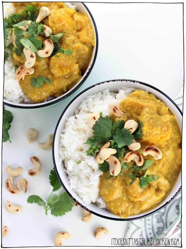 Pumpkin Cashew Curry! This 30 minute vegan curry is the perfect quick hearty dinner. Pumpkin chunks are simmered in a rich curry cashew cream. Dairy-free. #itdoesnttastelikechicken