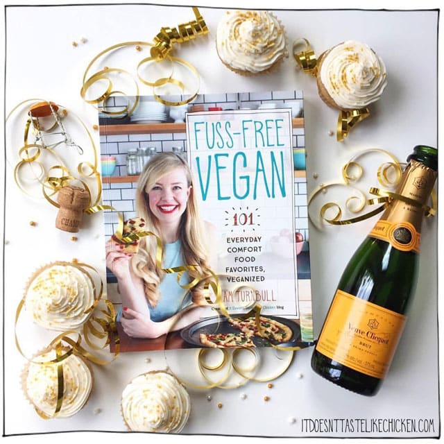 Celebrate the release of cookbook Fuss-Free Vegan with Vegan Champagne Cupcakes! Easy to make but so elegant. Perfect for any celebration such as New Year's Eve or birthdays! Light, fluffy, and sweet with a hint of champagne flavour. Pop that champagne! Dairy free, egg free. #itdoesnttastelikechicken