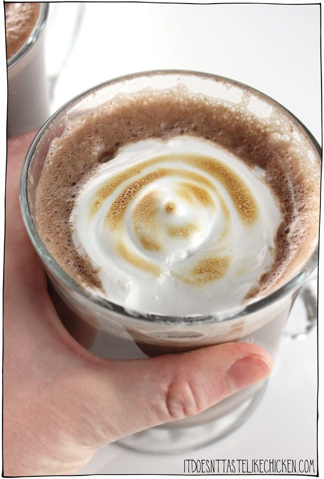 Easy Vegan Hot Chocolate with toasted marshmallow fluff! Yes please! This dairy-free treat whips up in just 15 minutes (including making the marshmallow fluff) for the perfect winter holiday treat. #itdoesnttastelikechicken