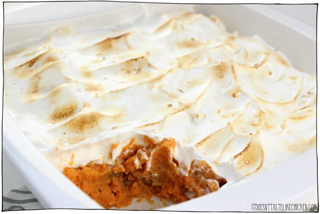 Vegan Sweet Potato Casserole with Marshmallow. Easy to make Thanksgiving classic side dish made vegan! Creamy sweet potato layer topped with homemade vegan marshmallow fluff (takes just 10 minutes to make). Toasted with a brulee torch for toasted marshmallow perfection. #itdoesnttastelikechicken