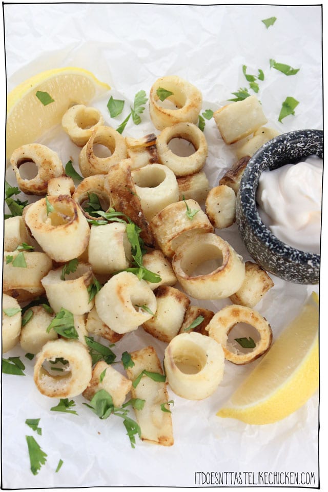 Heart of Palm Calamari! Heart of palm is the perfect vegan substitute for calamari. The tender, flaky texture is perfect. Toss in seasoned flour mixture and serve with wedges of lemon for an easy vegetarian seafood treat! #itdoesnttastelikechicken #heartofpalm #veganseafood #calamari