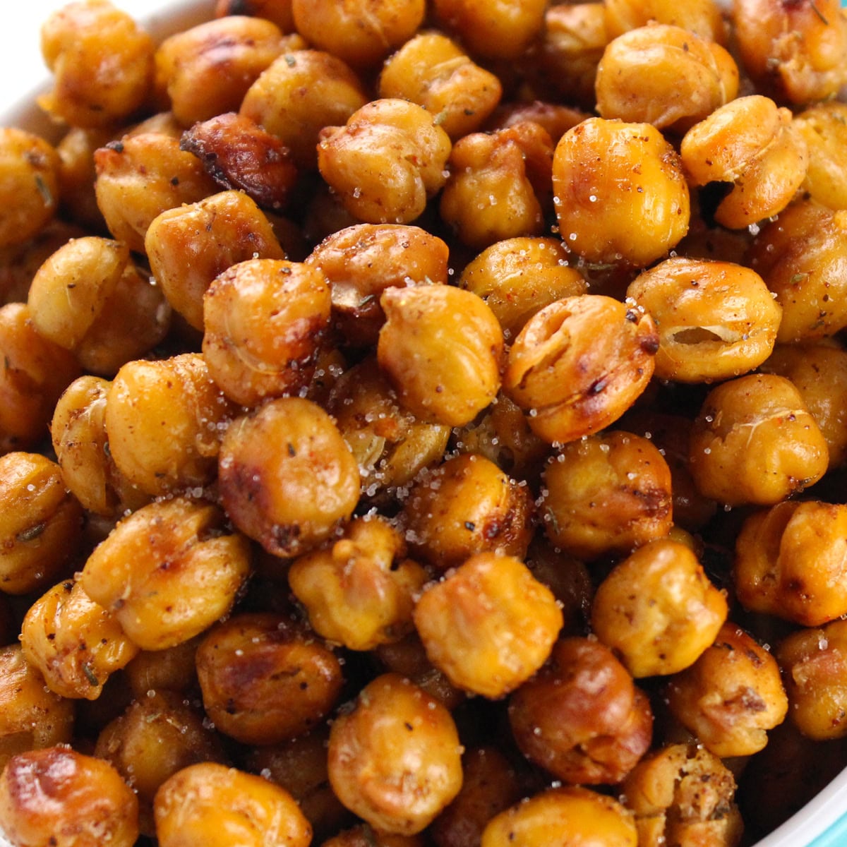 Closeup of crunchy roasted chickpeas looking golden and delicious.