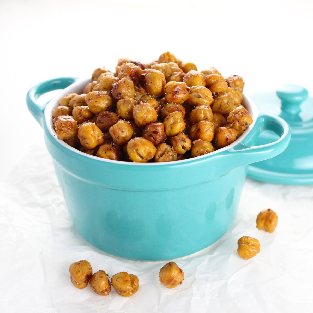 Turquoise dish filled with roasted chickpeas.
