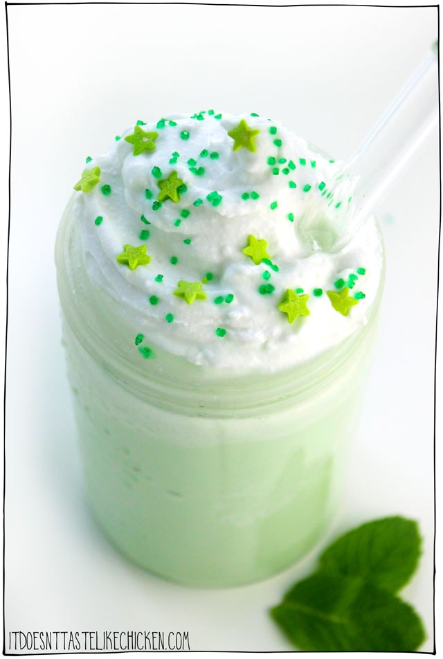 The Ultimate Vegan Shamrock Shake! This dairy-free St. Patrick's day dessert is easy to make! Just freeze coconut milk in an ice cube tray and blend with plant-based milk and some flavourings for a creamy, delicious, mint milkshake. #itdoesnttastelikechicken #stpatricksday #stpatricksdayrecipe #veganrecipes