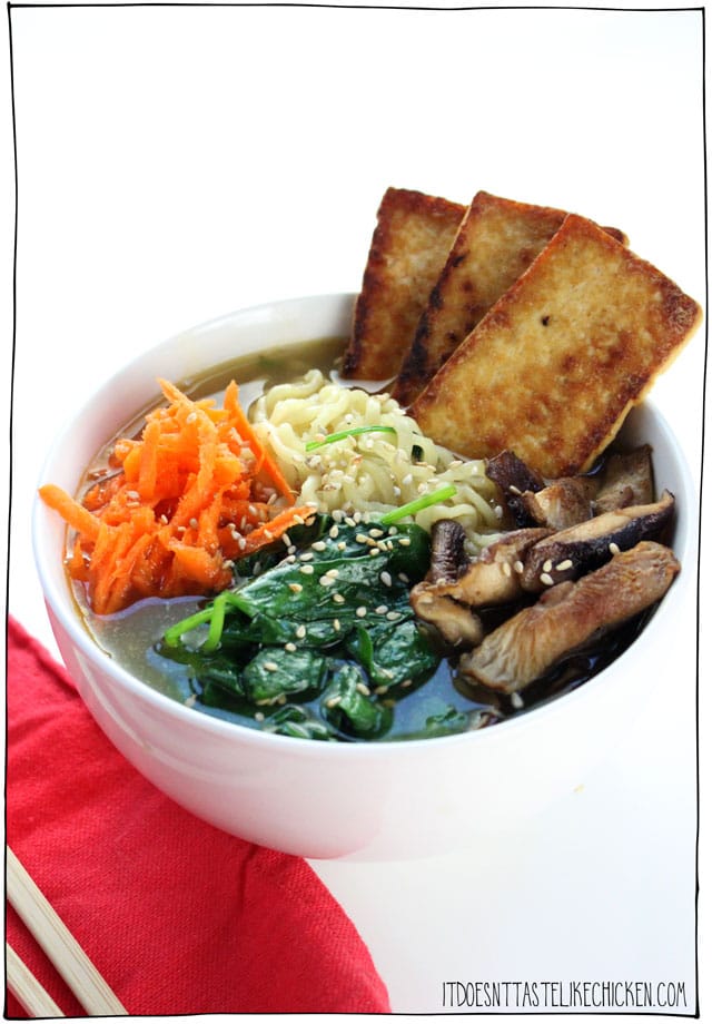 Vegan Ramen Noodle Soup! Toss out those flavour packets and instead make this easy weeknight meal. With fresh veg, sautéd mushrooms, crispy tofu slices, and ramen noodles in hot broth. #itdoesnttastelikechicken #veganrecipe #ramen #vegansoup