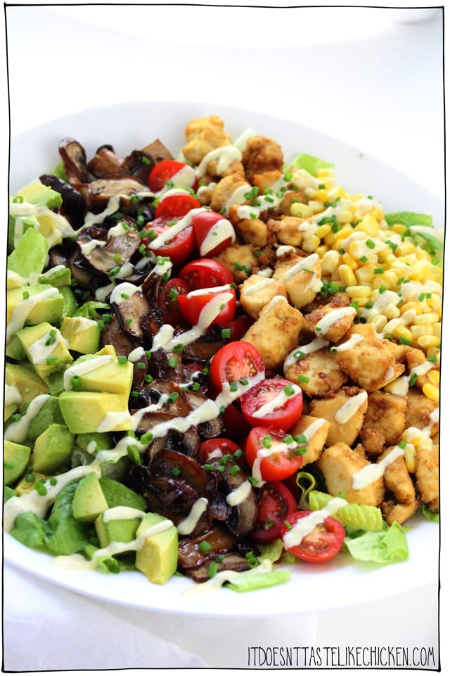 Vegan Cobb Salad with Blue Cheese Dressing!! Flavour bursting mushroom bacon, tender baked tofu, creamy avocado, juicy cherry tomatoes, sweet pops of corn on a bed of crispy romaine topped with a vegan blue cheese dressing. ← Now THAT is magic. #itdoesnttastelikechicken #veganrecipes #vegansalad #salad