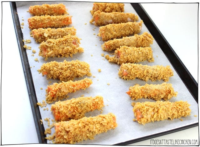 Carrot Fingers! Fish fingers? No thank you. Chicken fingers? Pssshhhh. Carrot Fingers? Um yes please, I'll eat the entire tray to myself, thanks! Carrot sticks are coated in a savoury seasoned crispy corn flake crust with a hint of maple syrup sweetness. Baked to crunchy golden perfection, these are anything but plain old carrot sticks, these carrot fingers are addictively scrumptious!  The perfect kid-friendly and adult-friendly snack. #itdoesnttastelikechicken #veganrecipes #vegankids 