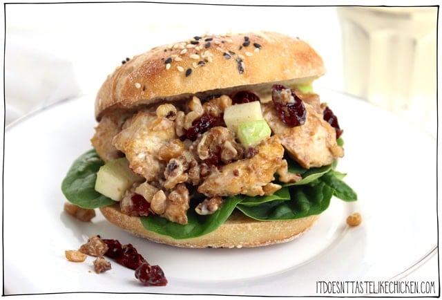 Hearty Vegan Tofu Salad Sandwich! With granny smith apple, dried cranberries, walnuts, and baked tofu bites mixed with vegan mayonnaise and dijon mustard. The perfect make-ahead sandwich for work or school. #itdoesnttastelikechicken #veganrecipes #tofu