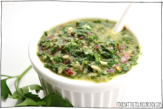 5-Minute Chimichurri Sauce! Just add the 8 ingredients to a blender, and pulse. That's it! With parsley, cilantro, red onion, garlic, and lime there is so much punch to this sauce, it can take any dish from bland to fabulous. #itdoesnttastelikechicken #veganrecipes #chimichurri