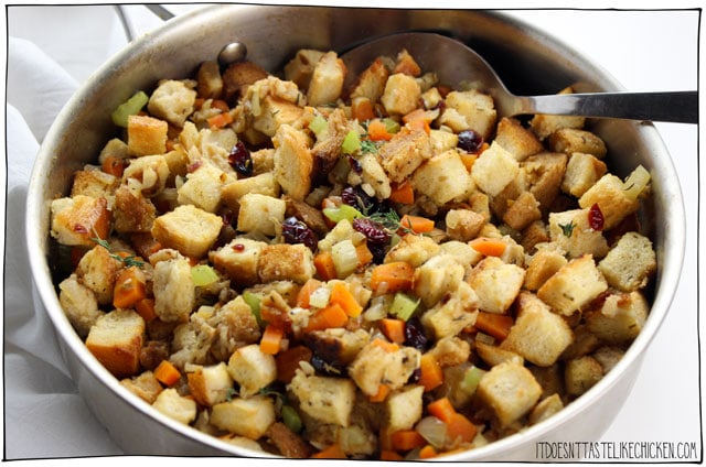 Easy Vegan Stove Top Stuffing!! The perfect traditional stuffing for Thanksgiving or Christmas. Just 30 minutes and can be made ahead of time. Perfectly seasoned, fluffy, with sage, thyme, rosemary and dried cranberries. #itdoesnttastelikechicken #veganrecipes #veganthanksgiving #thanksgiving