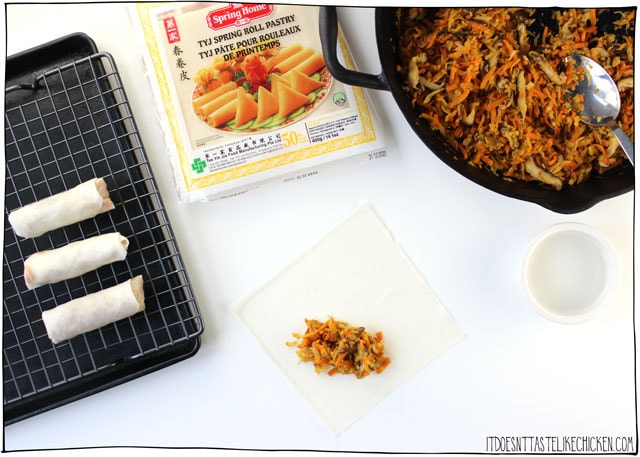 Vegan Baked Spring Rolls! Guilt-free spring rolls! Baked instead of fried means these spring rolls are a healthier alternative. Easy to make, and can be made ahead of time and frozen. Perfect appetizer for a party! Oil-free option. #itdoesnttastelikechicken #veganrecipes #veganappetizer