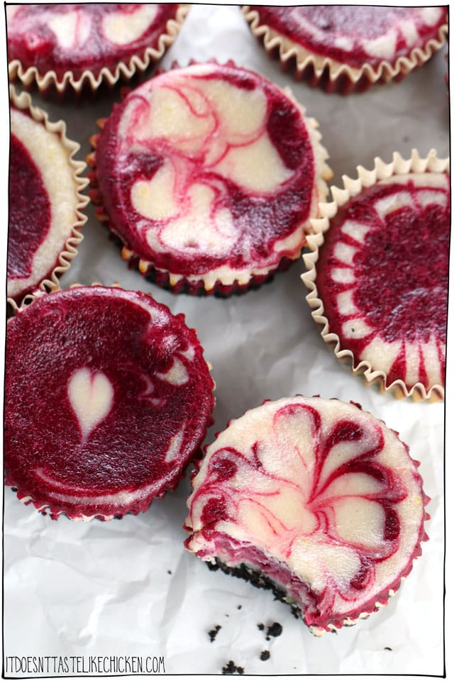 Vegan Red Velvet Cheesecake Bites! Swirls of lemon and red velvet cheesecake with a chocolate crumb crust. Easy to make, and no weird ingredients! Perfect for Valentine's day or a special occasion. Dairy free. #itdoesnttastelikechicken #veganrecipes #vegandesserts #valentinesday #dairyfree