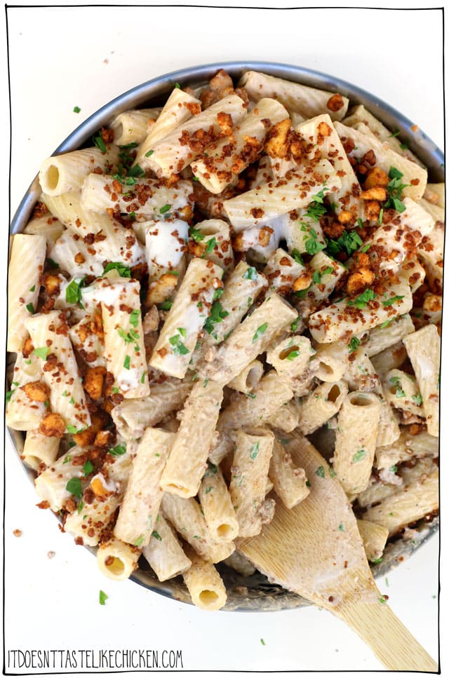 Vegan Chorizo Garlic Cream Pasta! Chewy flavour-packed easy homemade vegan tofu chorizo, paired with a 5-minute dairy-free garlic cream sauce, all tossed together with hot pasta. Yes, yes, and more yes!!! Easy to make and even easier to eat. #itdoesnttastelikechicken #veganrecipes #veganpasta