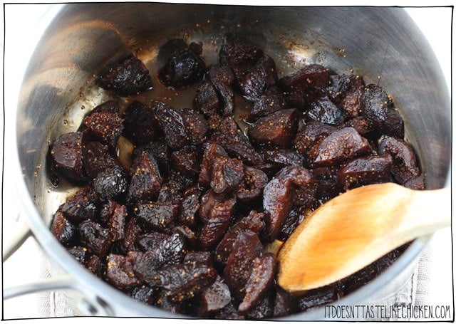 chop the figs and simmer them until soft for the filling of your fig cookies