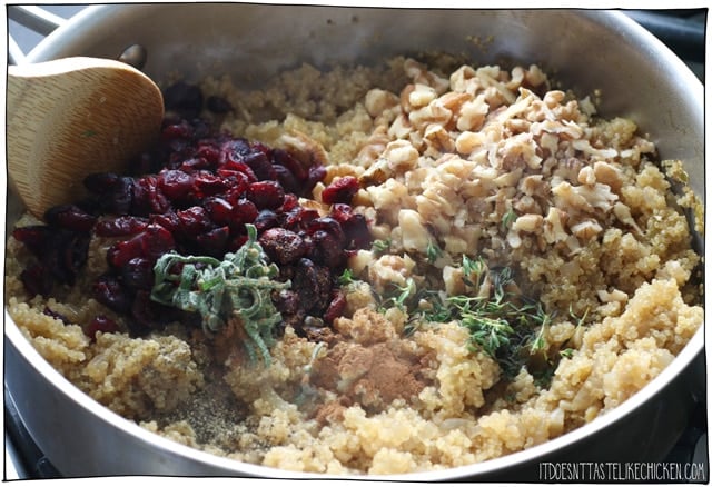 Mix the quinoa with the herbs, nuts, cranberries and holiday spices