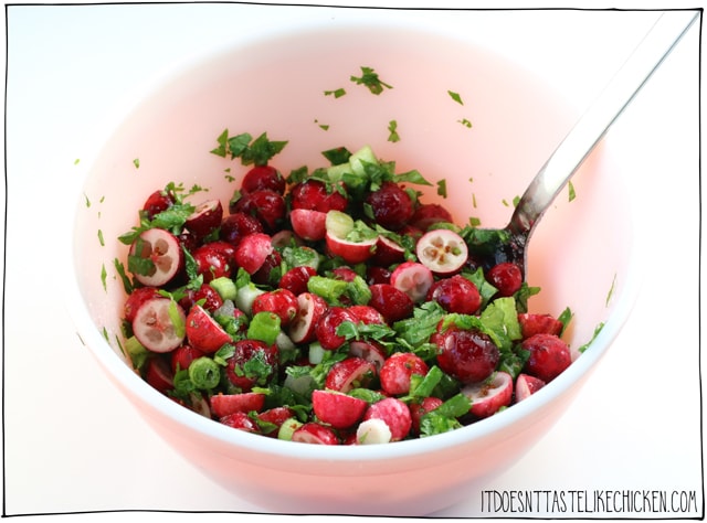 Mix raw cranberries with jalapeno, green onions, cilantro, lemon, and sugar.