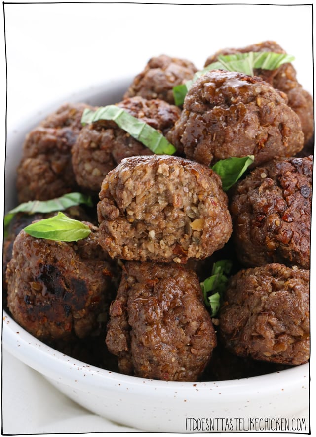 Vegan Italian Seitan Meatballs! Juicy, tender, flavourful, perfect for enjoying as an appetizer with a dipping sauce and even better for topping on pasta. Easy to make and can be prepared ahead of time or frozen for later. #itdoesnttastelikechicken #veganrecipes