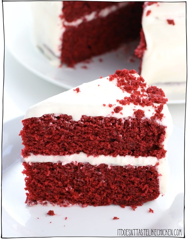 Vegan Red Velvet Cake! Tastes just like the traditional complete with a dairy-free cream cheese frosting! Easy to make. Perfect for Valentine's day or any occasion. #itdoesnttastelikechicken #veganrecipes #vegandessert