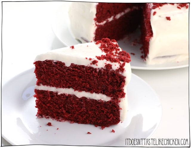 Vegan Red Velvet Cake! Tastes just like the traditional complete with a dairy-free cream cheese frosting! Easy to make. Perfect for Valentine's day or any occasion. #itdoesnttastelikechicken #veganrecipes #vegandessert