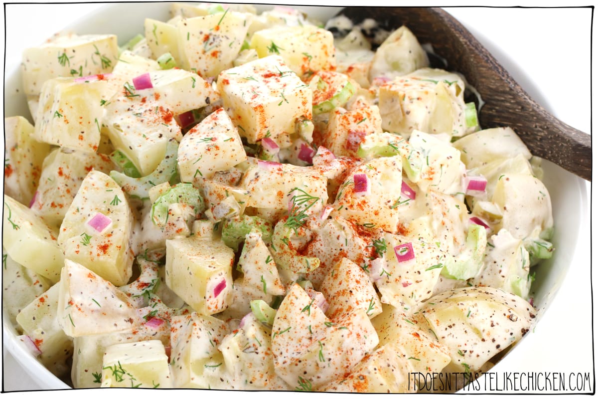Easy Vegan Potato Salad! Tender potatoes are coated in a creamy dreamy dressing with the perfect blend of herbs and seasonings. Easy to make and can be made ahead of time so it's perfect for meal prep, BBQ's, and potlucks. #itdoesnttastelikechicken #veganrecipe