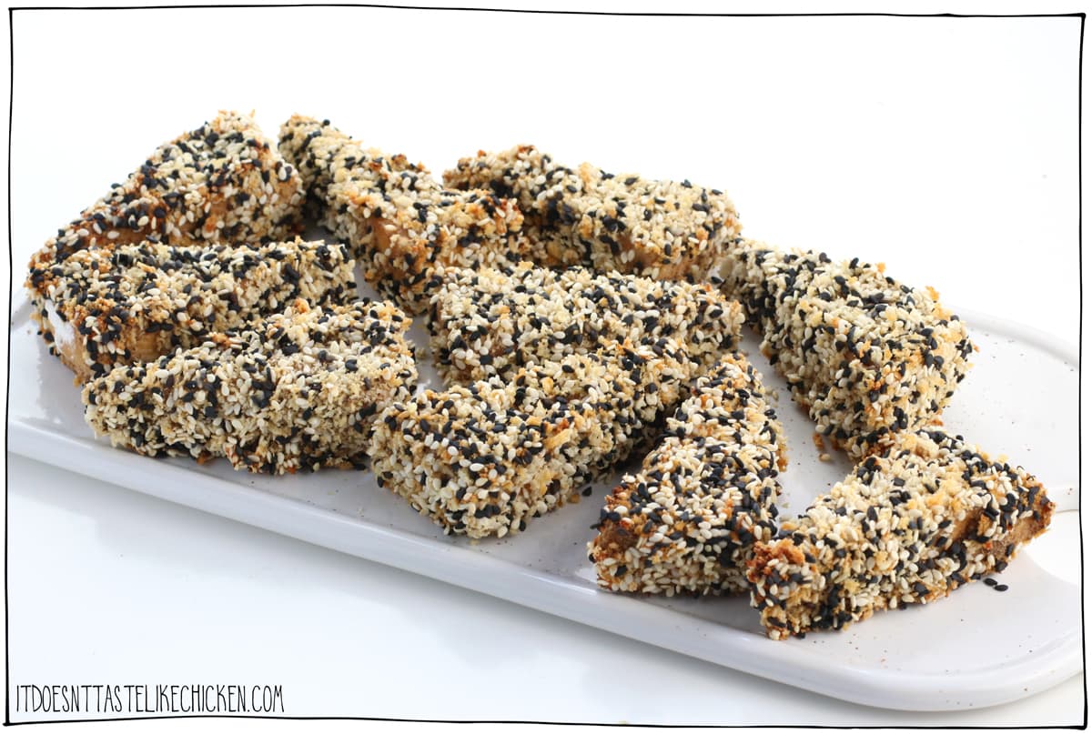 Crispy Sesame Crusted Tofu! Marinated tofu in a crispy crunch sesame crust. Great for a vegan appetizer or as a main dish served with your favourite sides. Gluten-free and oil-free options. #itdoesnttastelikechicken #veganrecipe #tofu
