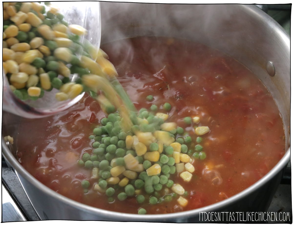 Add corn, beans, and peas and heat through.