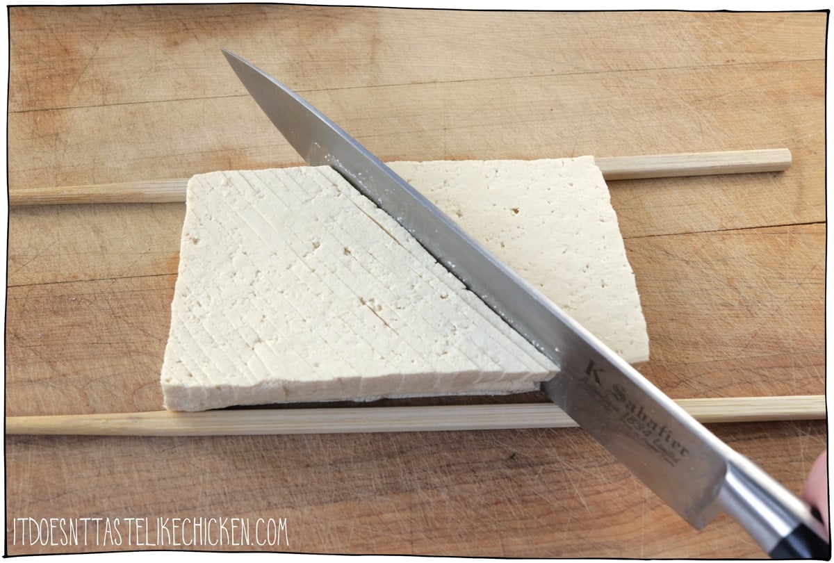 Slice the tofu thinly to make a flaky fish texture.