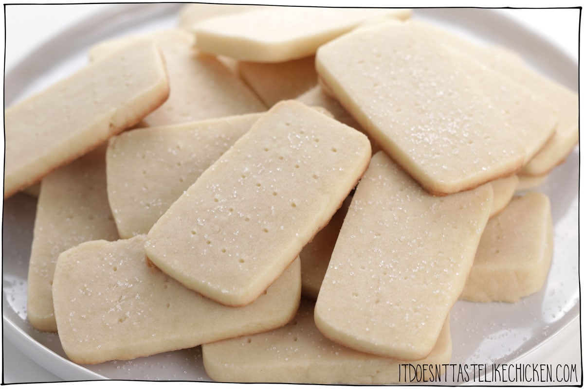 Easy Vegan Shortbread Cookies! Just 5 ingredients, and 20 minutes to make (plus chilling time). So simple, so buttery, melt in your mouth goodness. The cookie dough can be made ahead of time and even frozen if you like for easy cookie prep. Perfect for all the holidays: Christmas, Easter, Valentine's Day, or on any old day with a cup of coffee or tea. #itdoesnttastelikechicken #veganbaking #vegandesserts