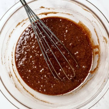 Whisk in bowl with melted chocolate mixture.