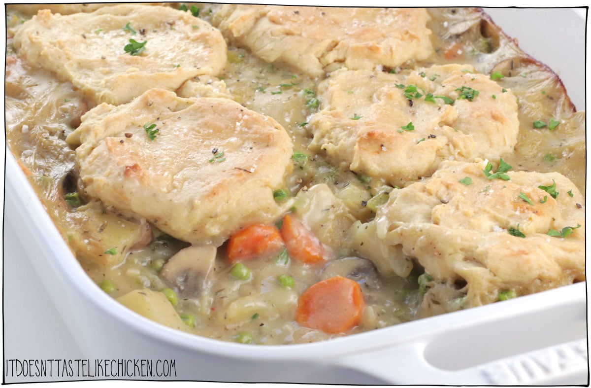 This vegan pot pie is easy to make, with a medley of vegetables in a creamy sauce, and flaky buttery vegan biscuits, yum!  Eating vegan doesn’t mean you have to miss out on the taste of pot pie, especially when you make it yourself. This easy vegan pot pie recipe is the most satisfying home-cooked comfort food. The perfect warming meal to enjoy this time of year! #itdoesnttastelikechicken #veganrecipe