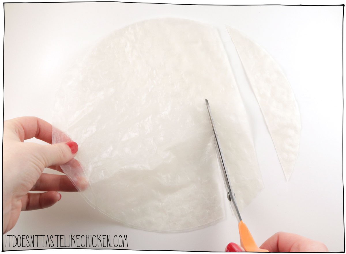 Wet two sheets of rice paper and stick them together. 