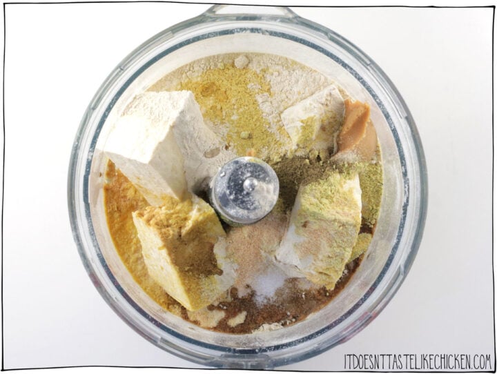 Add the tofu, vital wheat gluten, and all of the seasonings to a food processor.