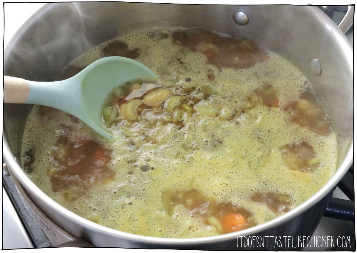 Add the vegetable broth, beans, and spices, and simmer for 5 minutes