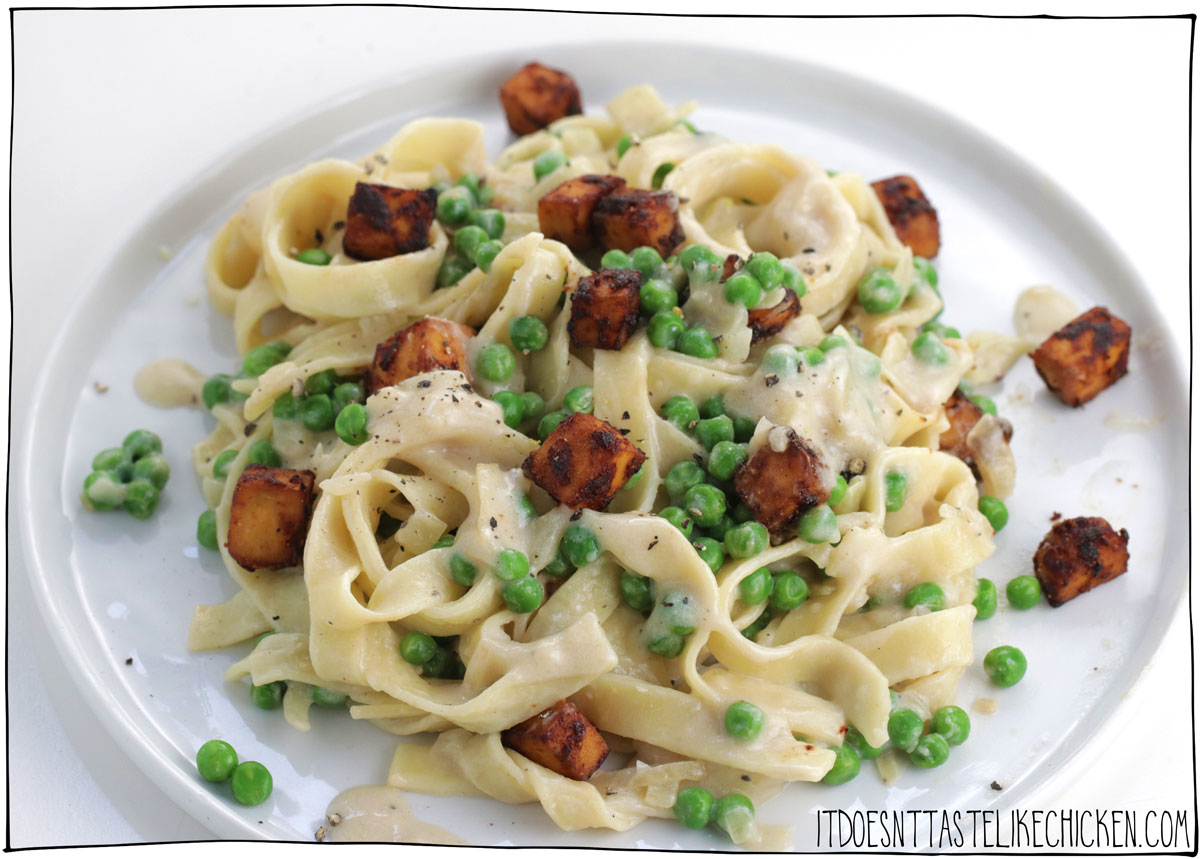 Vegan Creamy Pancetta & Pea Pasta takes just 30 minutes to make and is super creamy with pops of sweet peas, and topped with smoky vegan pancetta which is made from tofu! This recipe is easy to make and is bursting with flavor!